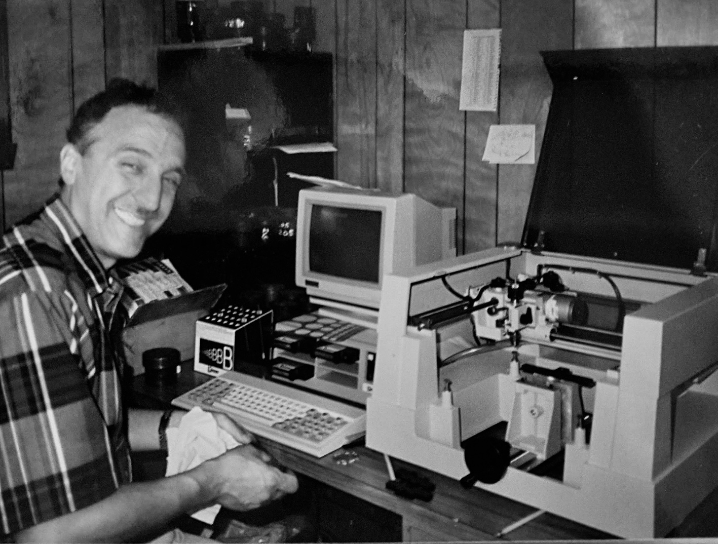 Julian Galperin in front of the first new engraving machine at Smith & Warren