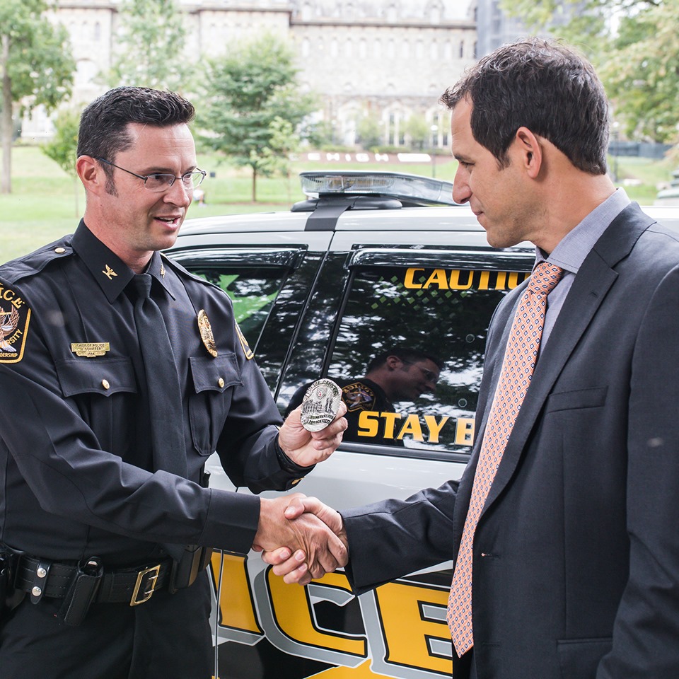 Lee Galperin, President of Smith & Warren shaking hands with LeHigh Police