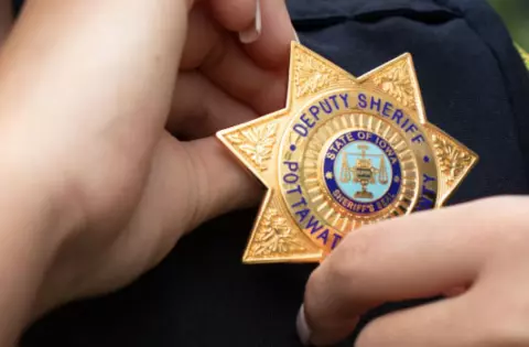 Badge being pinned on image