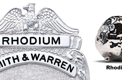 A rhodium badge sample with material